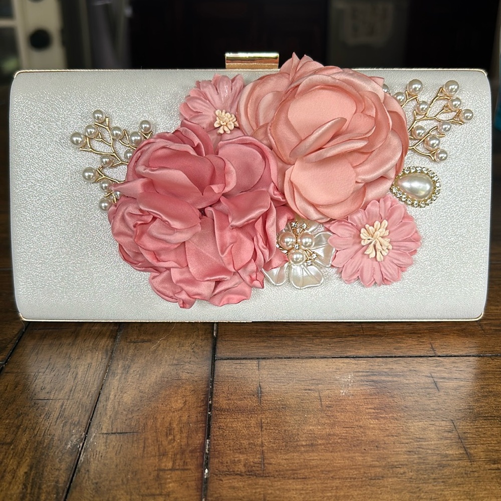 Beautiful floral and pearls clutch bag